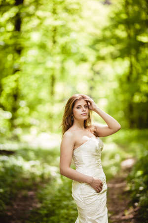 Bride portrait in the spring forestの写真素材