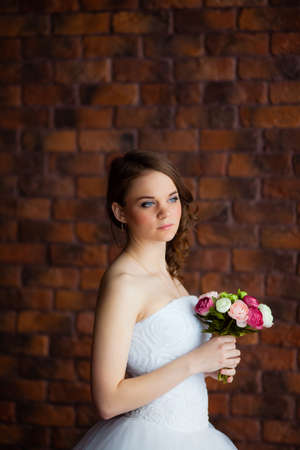 Young sexy bride in a studioの写真素材
