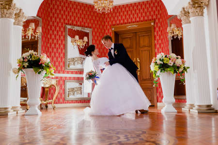 Awesome wedding couple indoor rich royal roomの写真素材
