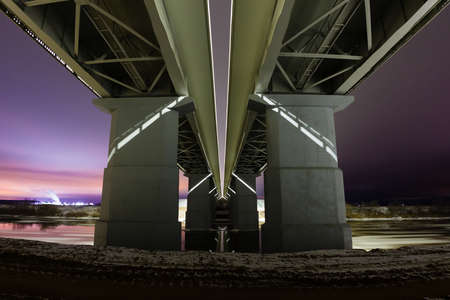 Epic view from under the bridge and night winter landscapeの写真素材