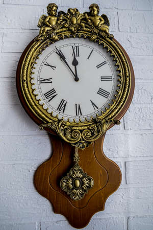 Christmas and New Year wall clock, 5 minutes before everything happens. Idea for holiday like Christmas and New year, for covers books, magazines, articles.の写真素材