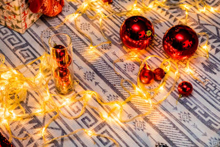 Christmas and New Year photo studio, box, presents, garlands, gray wall, balls (2). Idea for holiday like Christmas and New year, for covers books, magazines, articles.の写真素材