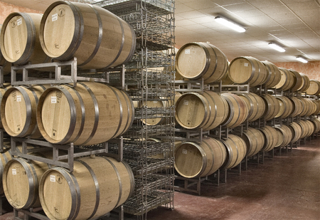 tradizional wooden barrel for aging of italian red wine like barolo and dolcetto