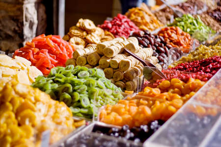 Colorful healthy dried fruits in the market, focus on figs