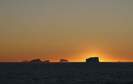 Iceberg in Arctic waters (Napassorsuaq Fjord, Greenland)の写真素材