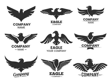 Set of black heraldic eagle heads and wingsのイラスト素材