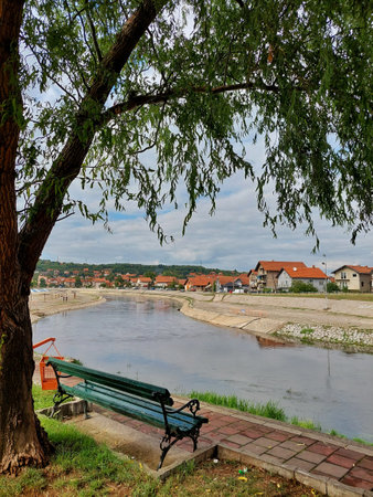 Landscape with river and benchの写真素材