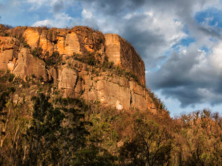 a canyon with a mountain overlookingの写真素材