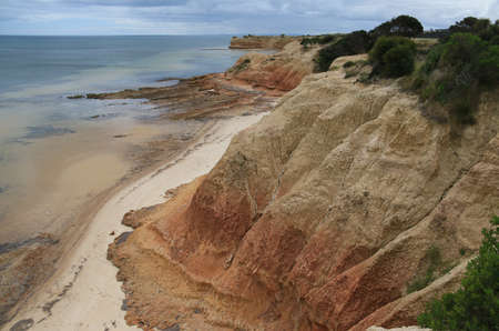 rocky coastline near a body of waterの写真素材