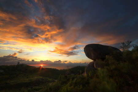 sunset from the rocks of a mountainの写真素材