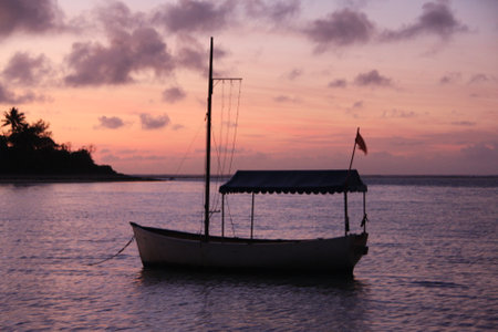 a small boat in a large body of water