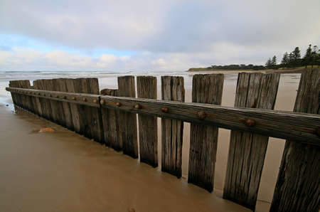 a gate on a beach in lorneの写真素材