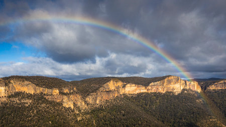Rainbow over the blue mountains in nswの写真素材