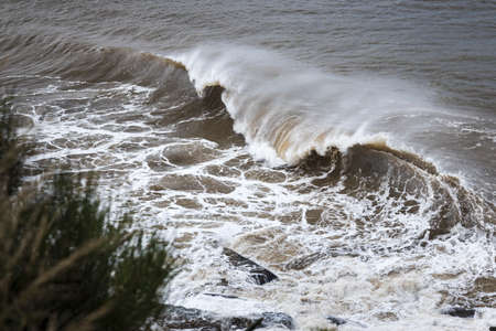 wave breaking in the ocean at umina point on nsw central coastの写真素材