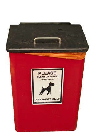 a dog waste collection container, provided by the local council to encourage the public to clean up pavements after there dogs の写真素材