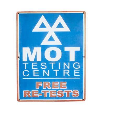 A sign on a local garage to promote the service of M O T testing の写真素材