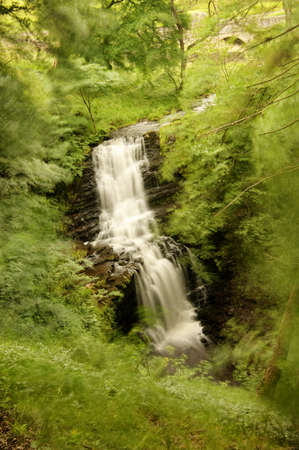 The Scalebar Force is a dramatic waterfall which falls into a deep ravine on the Yorkshire Moors near the town of Settle  A gale force wind was raging at the time の写真素材