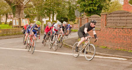 The leading cyclist sets a fast lead time in this time trials event  The event was staged to pass through local villages in Lincolnshire のeditorial素材