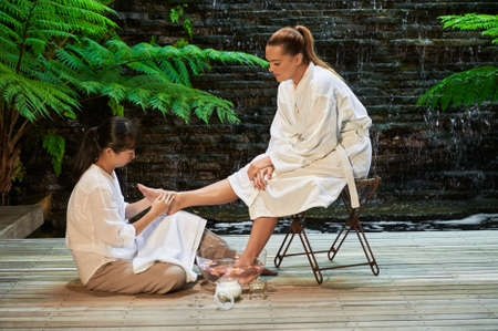 asian foot massage salts gentle spa treatmentの写真素材