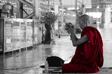 Monk at Reclining Buddha, Yangonのeditorial素材