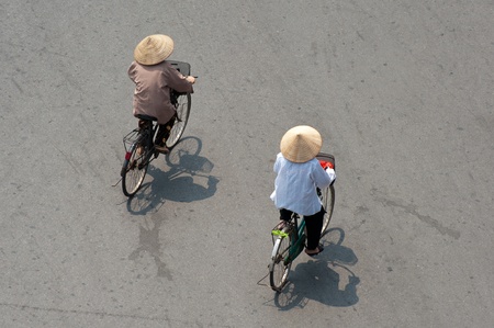 Cycling in Conical Hatsの写真素材