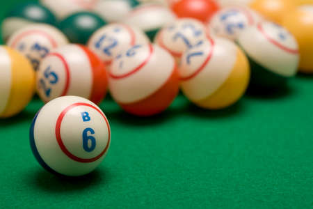 Bingo Balls on Green Felt Tableの写真素材