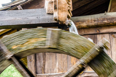 Water mill, detail with unsharpness by movement of the wheel
