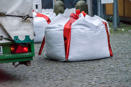 Gifhorn, Lower Saxony, Germany, December 2,2017: Edge of the Christmas Market with Barriers camouflaged as gifts to protect against terrorist attacks with trucksのeditorial素材