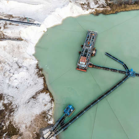 Aerial photograph of a large suction dredger in a wet mining process for quartzite snow-white sand, made with droneの写真素材
