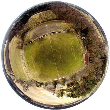 Spherical panorama from composite aerial photos of a football field in a village in the heath, made...