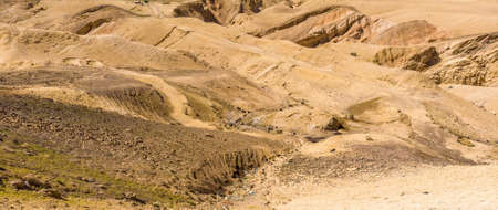 Stone desert in Jordan, hostile landscape next to the Kings Highway in front of Wadi Mujib, deeply...