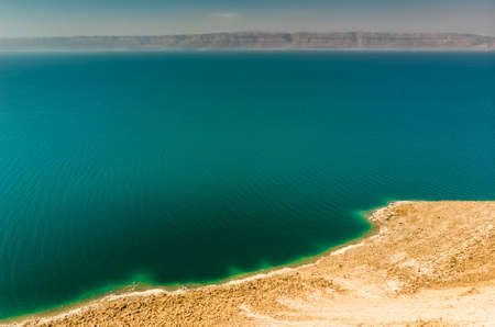 View from the Jordanian coast over the Dead Sea to the mountains on the west side in Israel, middle eastの写真素材