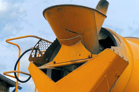 Close-up of the rear part of a concrete mixer with the filling funnel for the liquid concrete, Germanyの写真素材