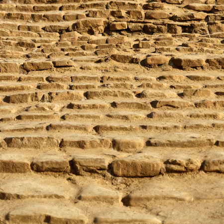 Stairs with treads of single hewn sandstone blocks leading to the beach of Amman at the Dead Sea, Jordanの写真素材