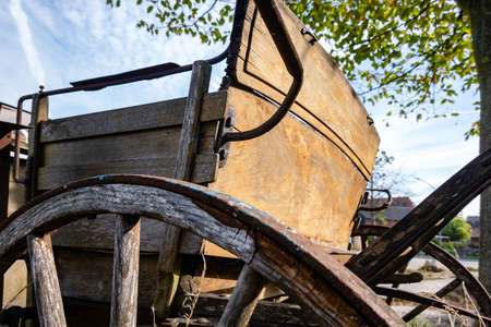 Rear of an old horse-drawn carriage no longer in useの写真素材
