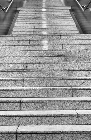 Detailed view of the staircase and the steps at the staircase of a subway station.の写真素材