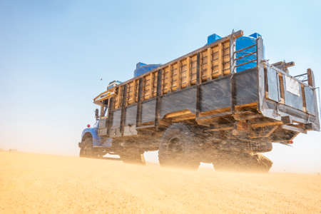 Water wagons and water barrels in the middle of the desert of Sudanの写真素材