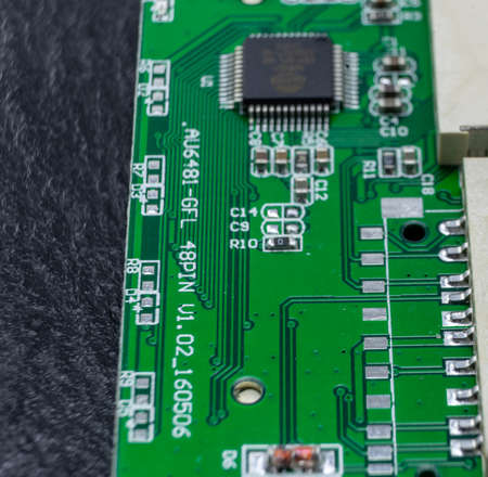 Close-up of an electronic component, the inner workings of a card reader for the computer, electric