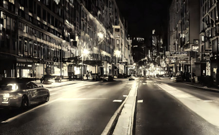 Busy street with cars and lights in a big city in dark night, made with generative aiの素材