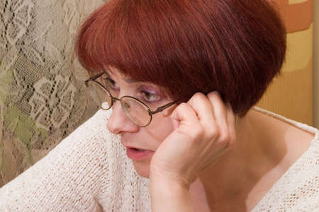 Dark-haired lady with spectacles