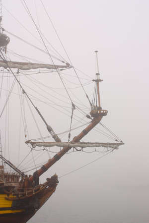 Sailing-ship embark on an unchartered sea.Way through the mist.の写真素材