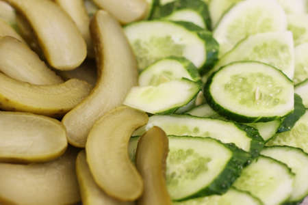 Close-up of cut fresh and pickled cucumbersの写真素材