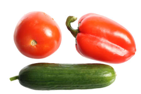 Tomato, cucumber and bell pepper, isolated on white backgroundの写真素材