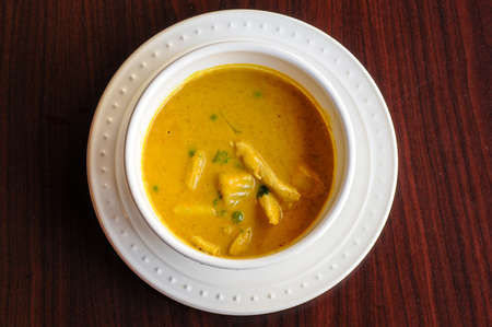 Yellow Curry, A mild curry sauce and coconut milk with potatoes and green peas.