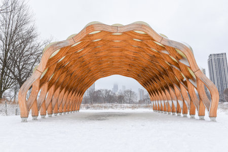 Huge wooden arches in a park in the city center.の写真素材