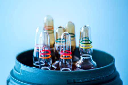 Medical ampoules on blue background. Medical ampoules.の写真素材