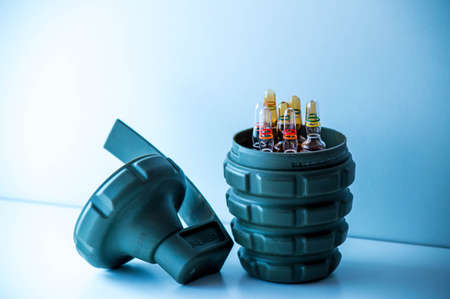 Disposable syringes with ampoules on a light background