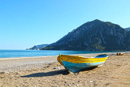 Colorful boat on a mediterranean beachの写真素材