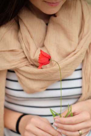 Girl and poppy flower