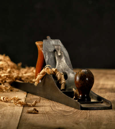 Jack plane on carpenter's table with chips scattered aroundの写真素材